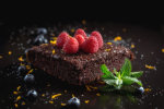 Delicious chocolate cake with raspberries